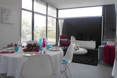 Chalet con caminetto in un villaggio vacanze