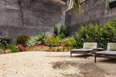 Leone Apartment with Garden