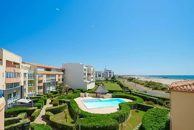 Familieappartement aan het strand in Cap...