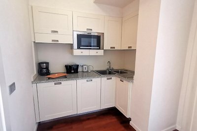 Appartement in Meina met gemeenschappelijk