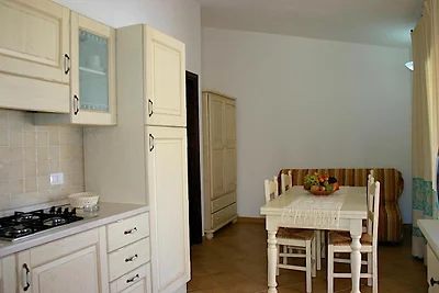 Wohnung in Badesi mit Swimmingpool