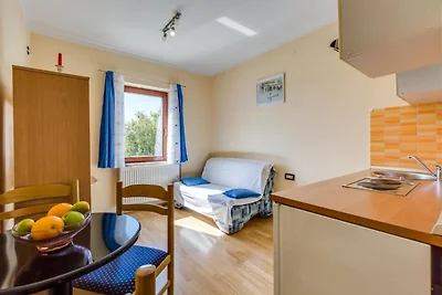 Appartamento con piscina, vista mare a...