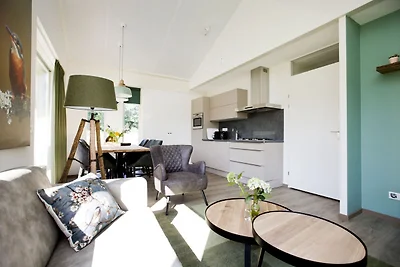 Bungalow mit einer überdachten Terrasse