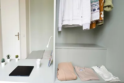 Camera accogliente in un accogliente appartam...