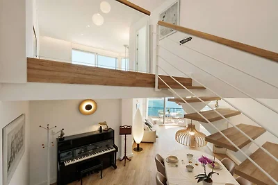 Duplex appartement met zwembad aan het strand...