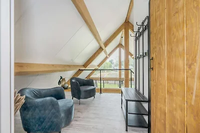 Soggiorno in lodge moderno con vista sullo...