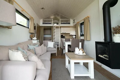 Lodge aan het meer met tuin