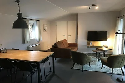 Chalet con giardino in un parco vacanze