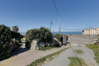 Meerblick mit Klimaanlage und Garten