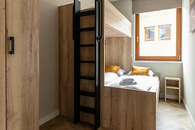 Elegante appartamento con sauna, area sciisti...