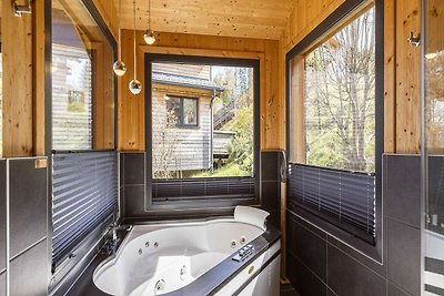 Chalet affascinante con sauna