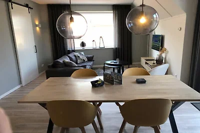 Lodge mit Blick auf die Kirche und die Dünen