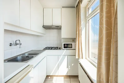 Penthouse aan Zee met Uitzicht