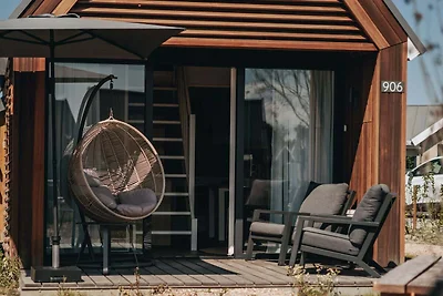 Modernes Tiny House mit Spülmaschine, Strand ...