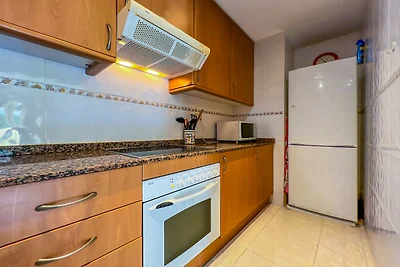 Appartement in Fenals bij Strand &...