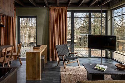 Leuke lodge met sauna in een natuurresort