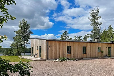 Spacieuse villa au bord du lac avec sauna