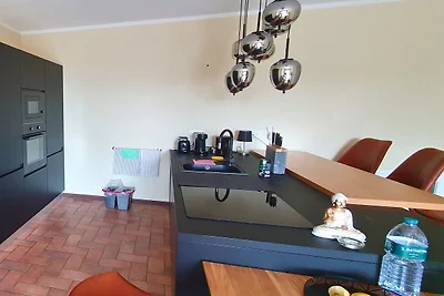 Appartement aan het zwembad in een Italiaanse...