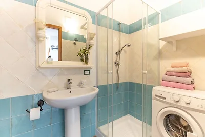Wohnung in Calagonone mit Garten