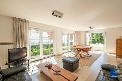 Wohnung in De Haan mit Garten