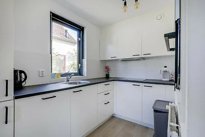 Bungalow aan het meer met tuin, geschikt voor...