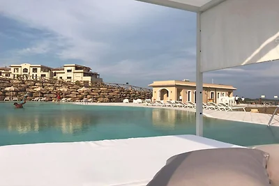 Apartment mit Garten im Resort mit Pool
