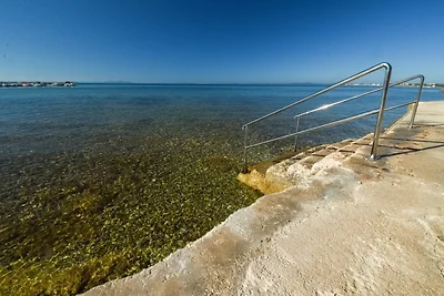 Apartment Kostanjevac with Terrace and Sea...