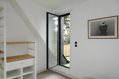 Modernes Ferienhaus mit Terrasse und Dachterr...