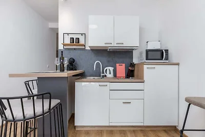 Modern appartement met zwembad en tuin