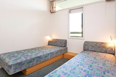 Apartament z tarasem w ośrodku wypoczynkowym