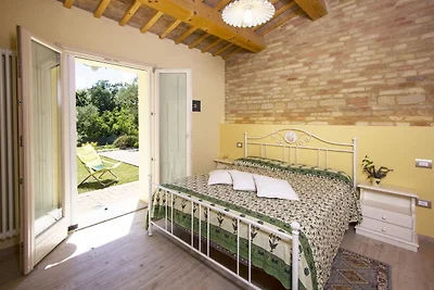 Gelassenes Ferienhaus in Fano mit Garten
