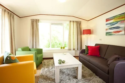 Well-kept chalet near the Maasduinen