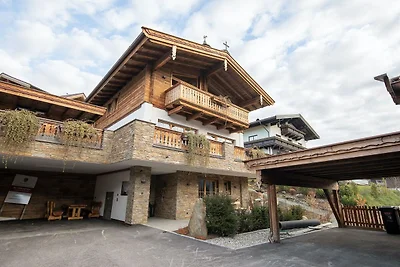 Luxe chalet met vier badkamers, bij een...