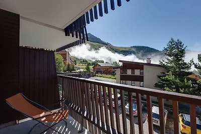 Slope-side apartment with balcony views