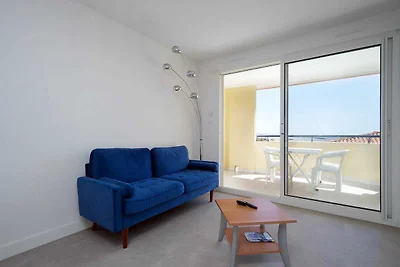 Familieappartement aan het strand in Cap...