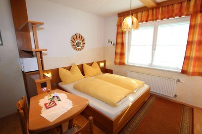 Apartamento con piscina cerca del telecabina...