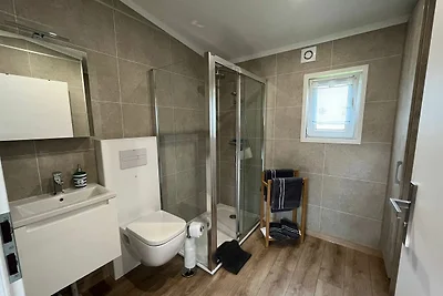 Ferienhaus in Nowe Warpno mit Garten