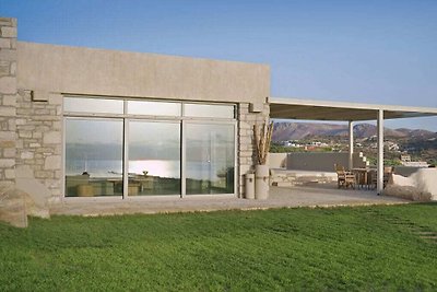 Villa Komos aan het strand