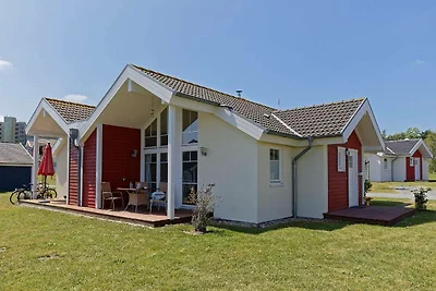 Bungalow moderno con stufa a legna e vista...