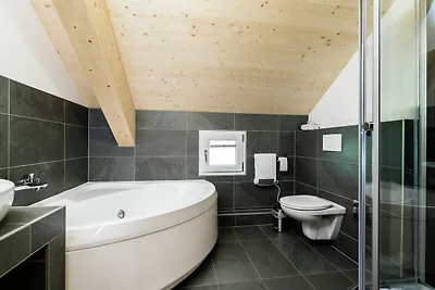 Accogliente chalet con vasca idromassaggio