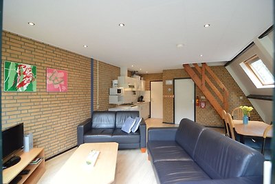 Modernes Ferienhaus inmitten eines üppigen Wa...