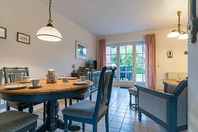 Apartment mit Kamin in einer reetgedeckten...