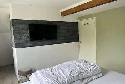 Ferienhaus mit Dünen, Strand und Meer