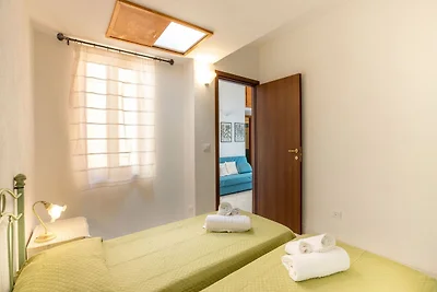 Wohnung in Calagonone mit Garten