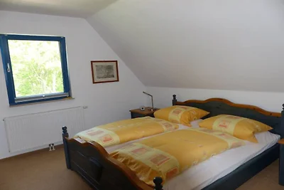 Casa de vacaciones con techo de paja y vistas...