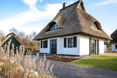 Casa con tetto di paglia sul Bodden con sauna