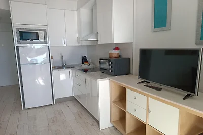 Appartement met terras en uitzicht op zee