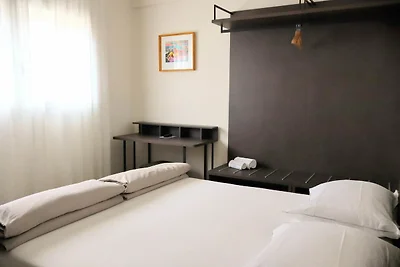 In einer klimatisierten Wohnung mit Terrasse