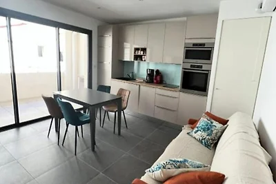 Wohnung in Grau du Roi am Strand