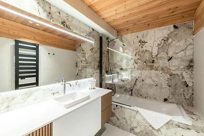 Chalet in Alpe d'Huez mit Spa und Skizugang